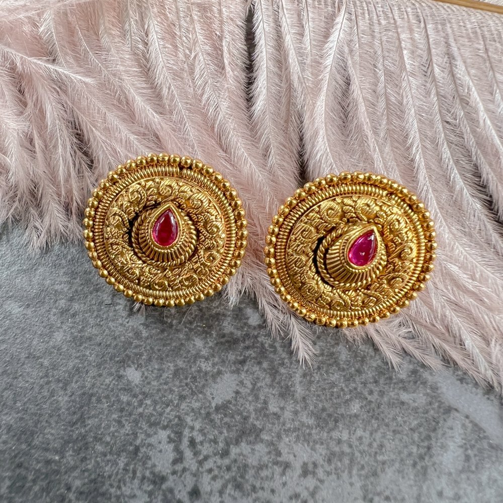 Traditional gold earrings on sale tops