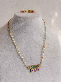 Dainty Pearl Kundan Necklace Set with Green & Pink Stones