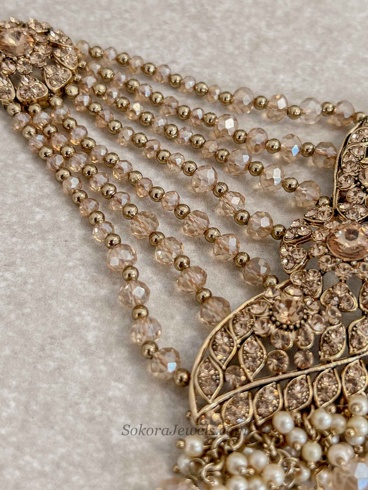 Gold Jhumar with Champagne beads