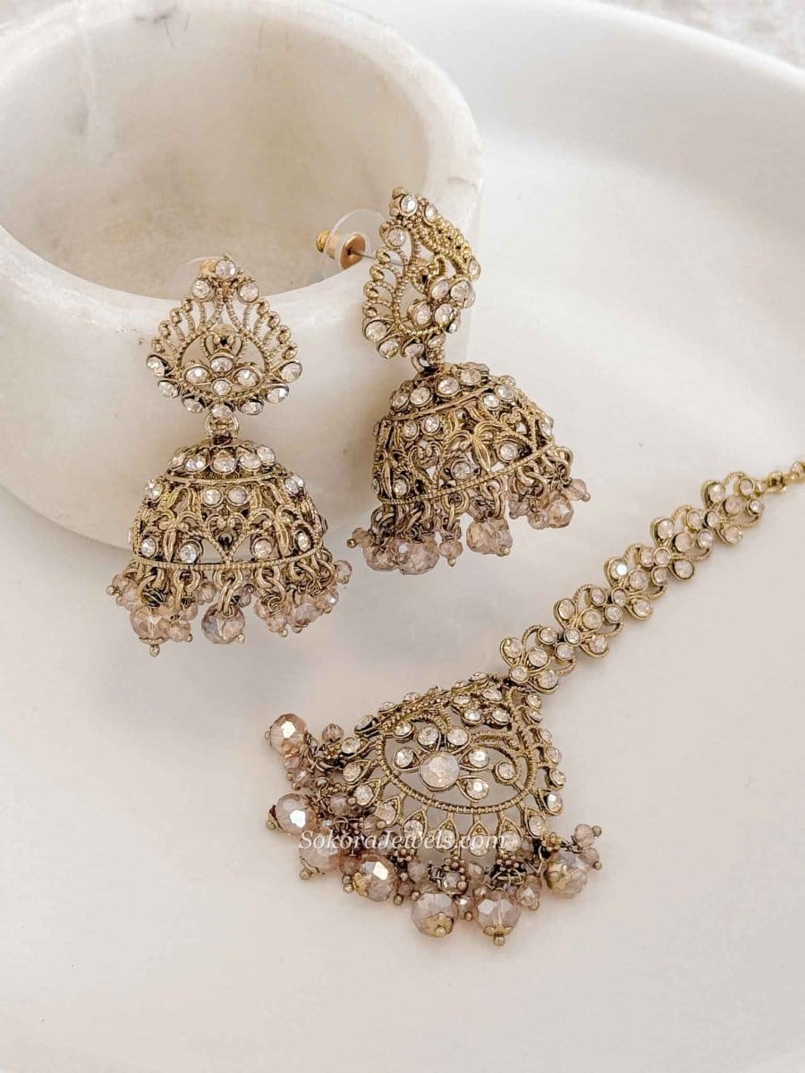 Antique Gold Crystal & Golden Bead Jhumka Earrings with Tikka Set - SOKORA JEWELSAntique Gold Crystal & Golden Bead Jhumka Earrings with Tikka Set