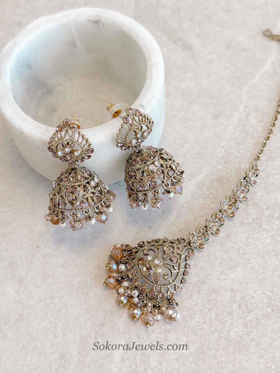 Antique Gold Crystal & Golden Bead Jhumka Earrings with Tikka Set - SOKORA JEWELSAntique Gold Crystal & Golden Bead Jhumka Earrings with Tikka Set