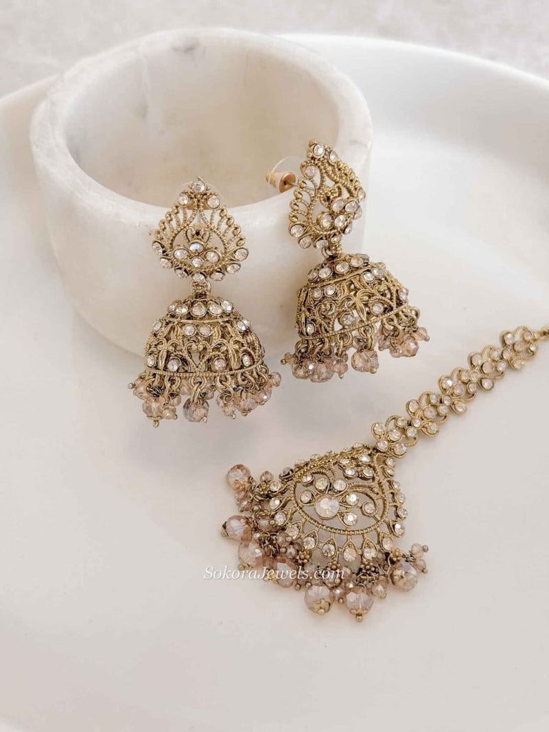 Antique Gold Crystal & Golden Bead Jhumka Earrings with Tikka Set - SOKORA JEWELSAntique Gold Crystal & Golden Bead Jhumka Earrings with Tikka Set