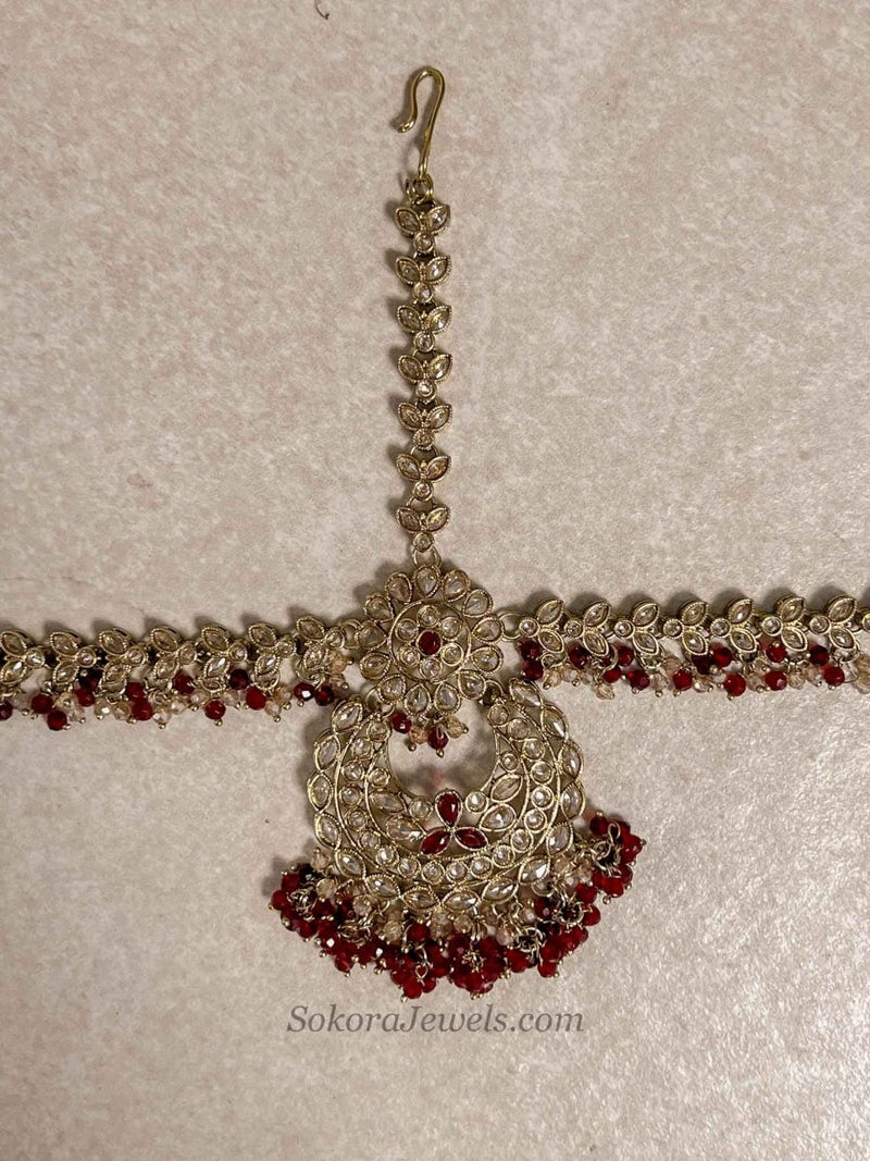 Antique Gold Maroon Mathapatti - SOKORA JEWELSAntique Gold Maroon Mathapatti