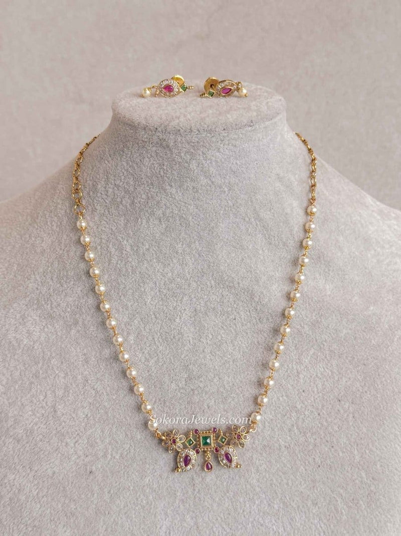 Dainty Pearl Kundan Necklace Set with Green & Pink Stones - SOKORA JEWELSDainty Pearl Kundan Necklace Set with Green & Pink Stones