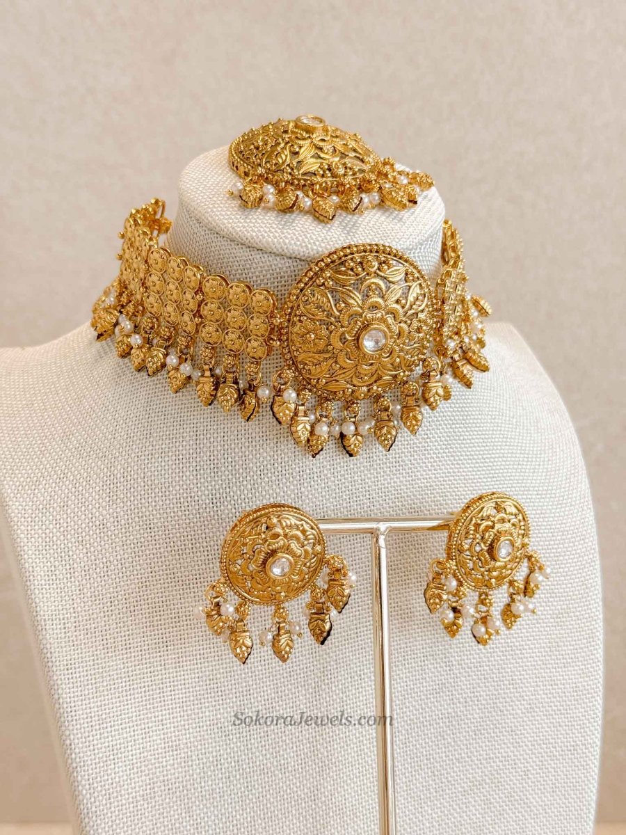Gold Ghungroo Choker Set – Elegant Occasion Wear - SOKORA JEWELSGold Ghungroo Choker Set – Elegant Occasion WearNECKLACE SETS
