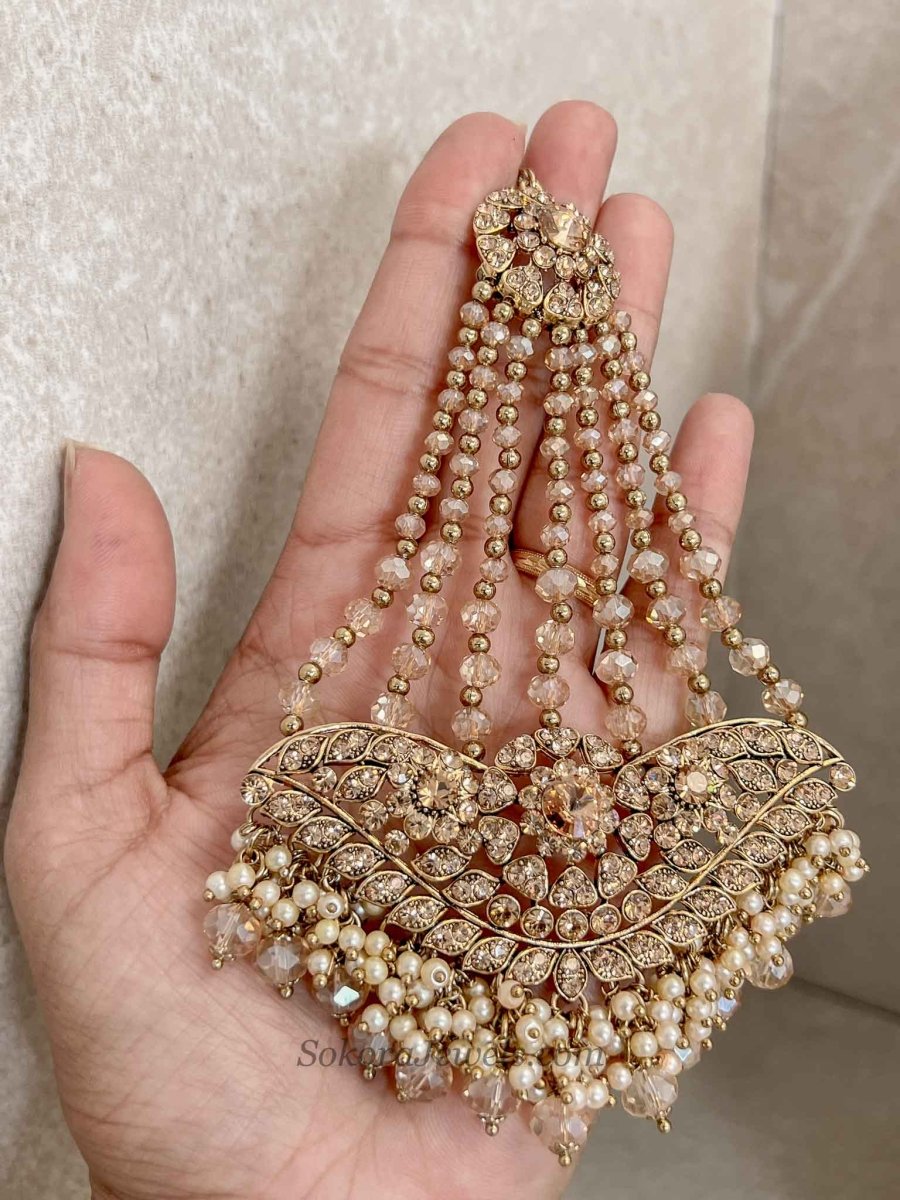 Gold Jhumar with Champagne beads - SOKORA JEWELSGold Jhumar with Champagne beads