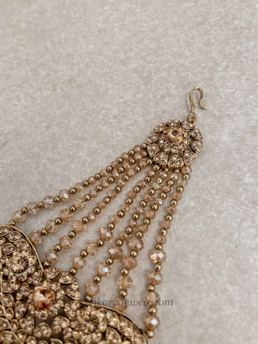 Gold Jhumar with Champagne beads - SOKORA JEWELSGold Jhumar with Champagne beads