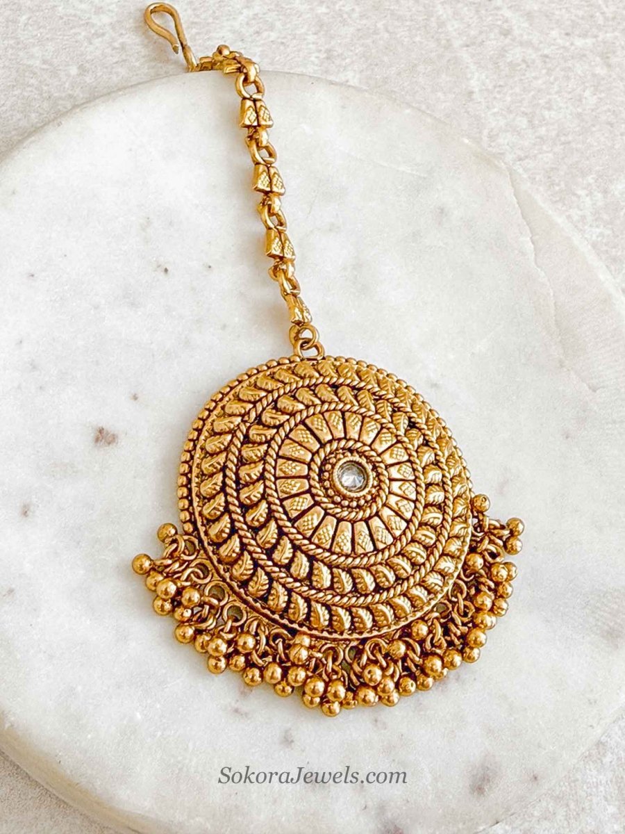 Gold Statement Maang Tikka – Gold Drop Finish - SOKORA JEWELSGold Statement Maang Tikka – Gold Drop Finish