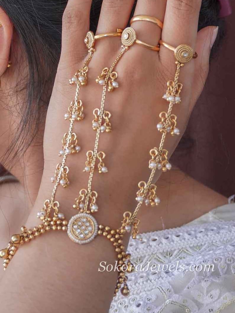 Kundan & Pearl Golden Hand chain - SOKORA JEWELSKundan & Pearl Golden Hand chain