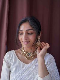 Mehak Emerald & Bird Motif Heritage Choker Set – Kundan & Ruby - SOKORA JEWELSMehak Emerald & Bird Motif Heritage Choker Set – Kundan & Ruby