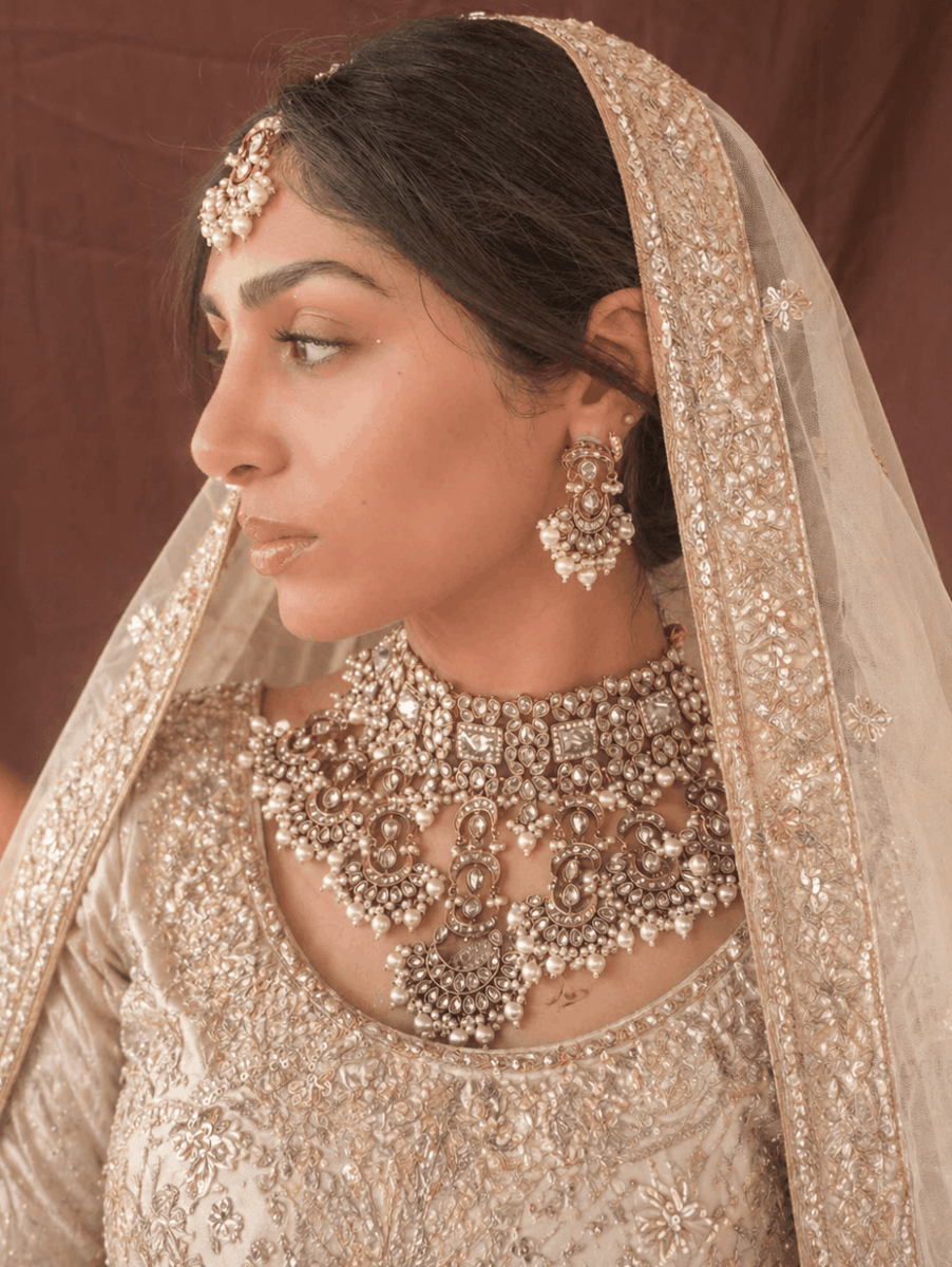 Navina Ivory Bridal Bib Necklace Set with Earrings & Tikka - SOKORA JEWELSNavina Ivory Bridal Bib Necklace Set with Earrings & Tikka