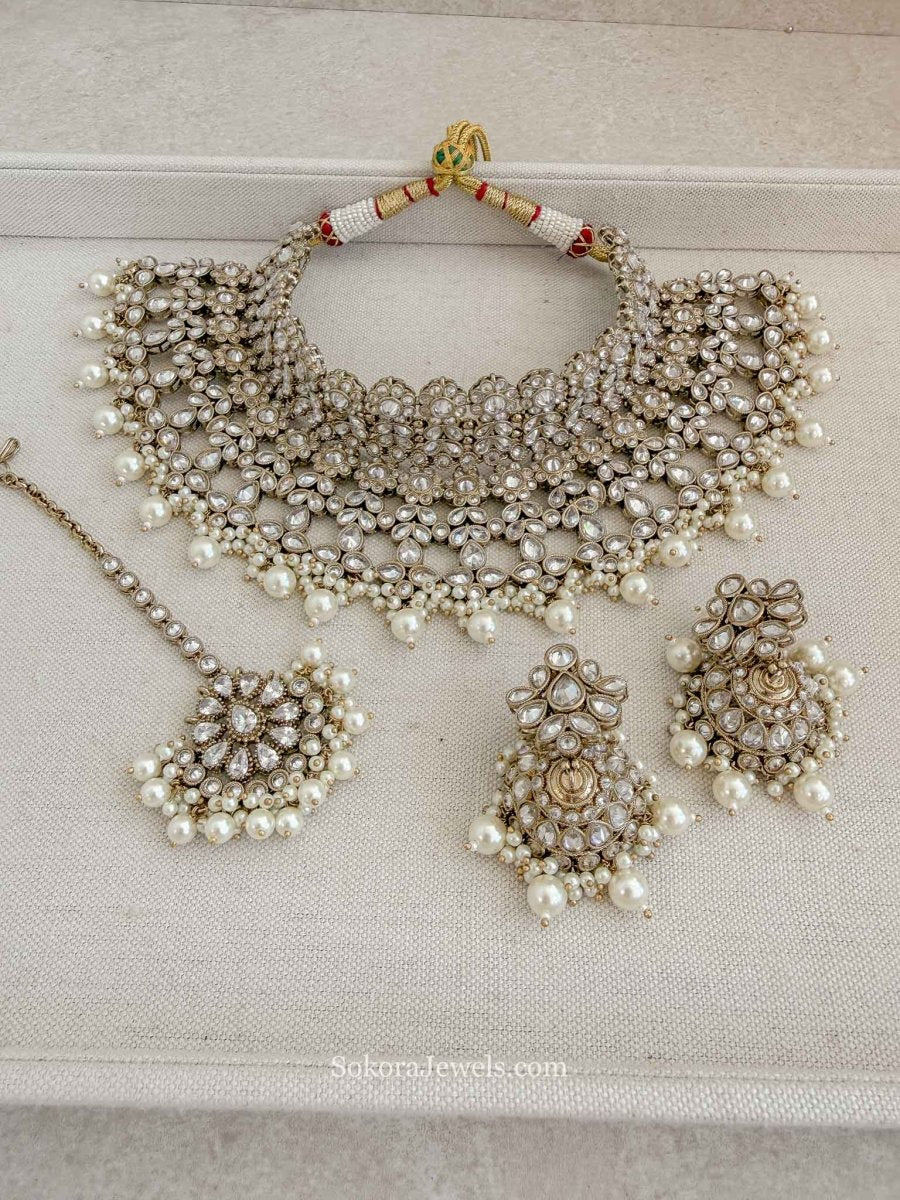 Sonam Antique Gold Bridal Necklace set with Jhumkas & Tikka - SOKORA JEWELSSonam Antique Gold Bridal Necklace set with Jhumkas & Tikka