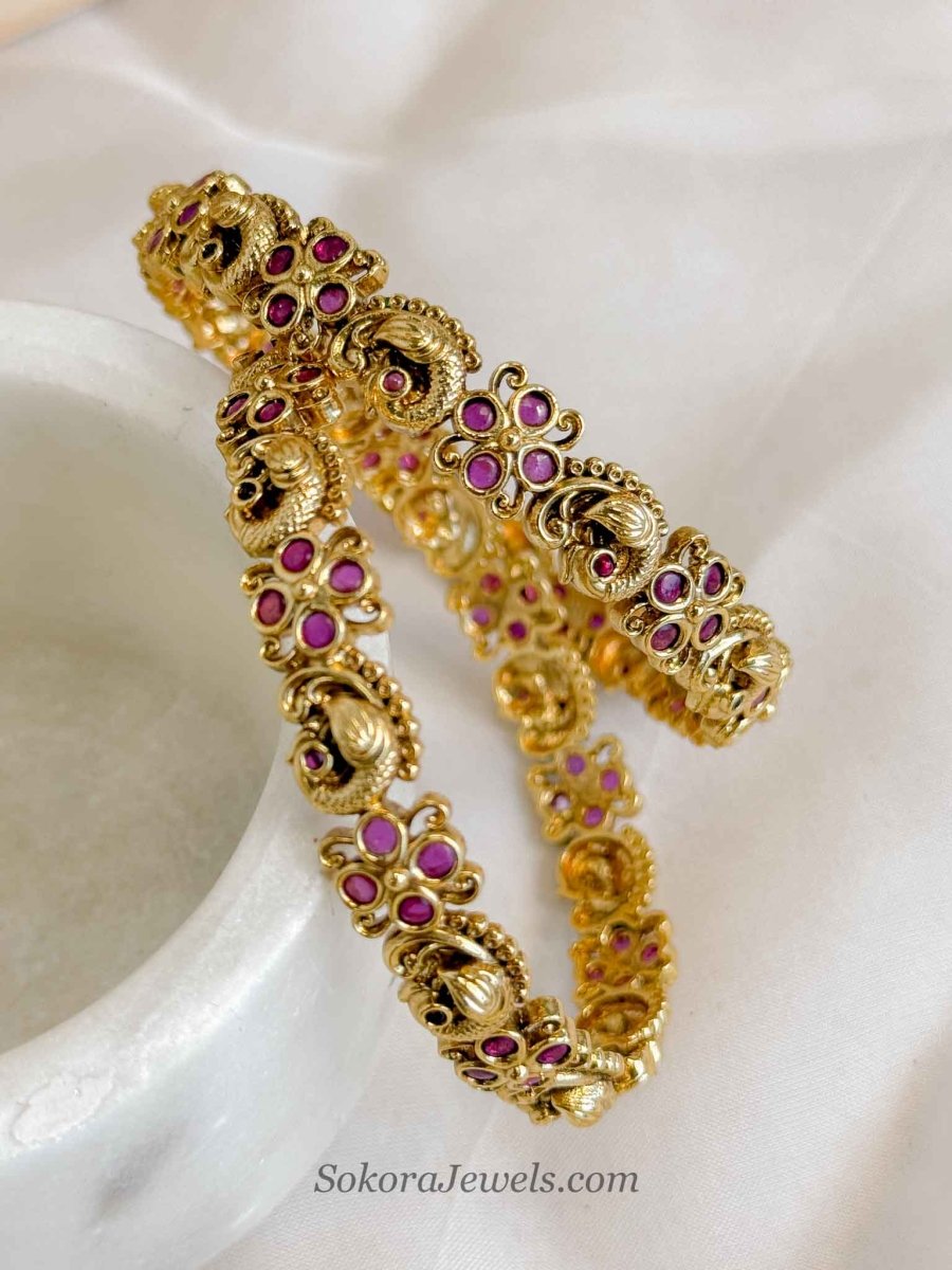 Temple Peacock Bangles – Antique Gold & Ruby Pink Stones - SOKORA JEWELSTemple Peacock Bangles – Antique Gold & Ruby Pink StonesBANGLES