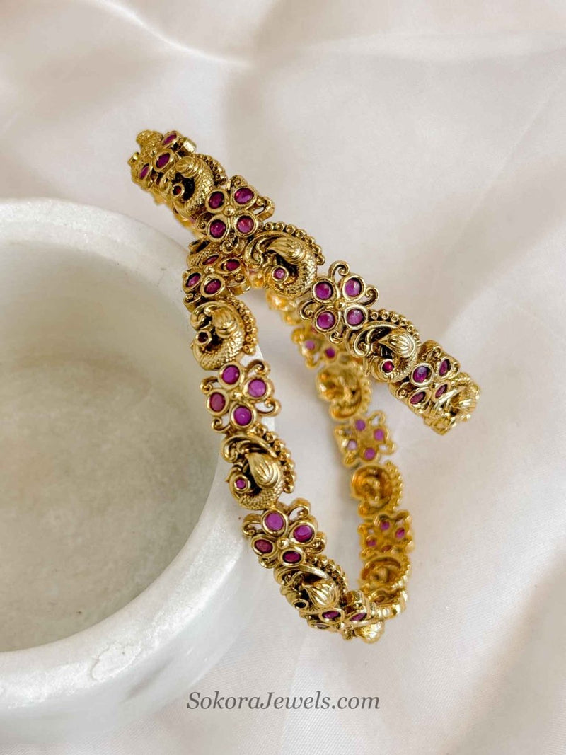 Temple Peacock Bangles – Antique Gold & Ruby Pink Stones - SOKORA JEWELSTemple Peacock Bangles – Antique Gold & Ruby Pink StonesBANGLES