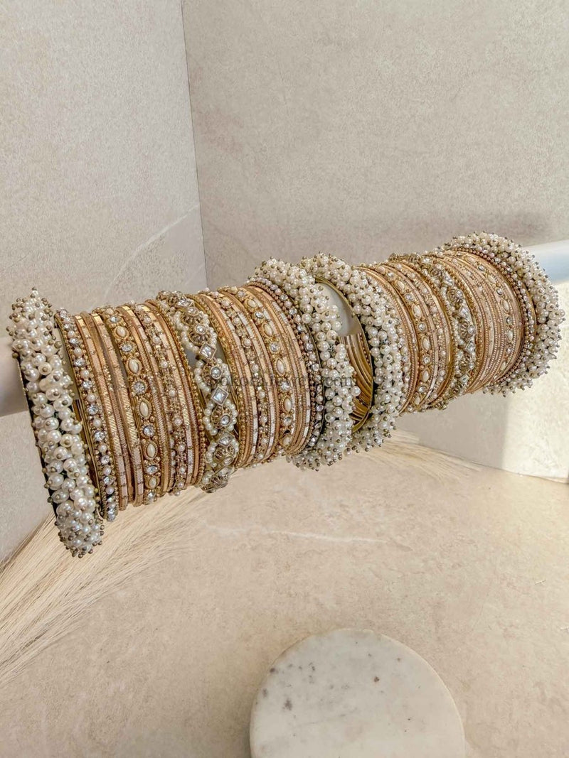 Thanjina Golden Bridal Bangle Stack For Asian Brides - SOKORA JEWELSThanjina Golden Bridal Bangle Stack For Asian BridesBANGLES