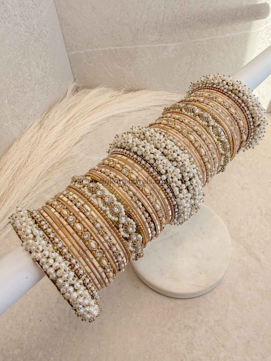 Thanjina Golden Bridal Bangle Stack For Asian Brides - SOKORA JEWELSThanjina Golden Bridal Bangle Stack For Asian BridesBANGLES