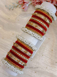 Thanjina Red Bridal Pearl Bangle Set – Indian Wedding Chura - SOKORA JEWELSThanjina Red Bridal Pearl Bangle Set – Indian Wedding ChuraBANGLES
