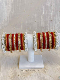 Thanjina Red Bridal Pearl Bangle Set – Indian Wedding Chura - SOKORA JEWELSThanjina Red Bridal Pearl Bangle Set – Indian Wedding ChuraBANGLES