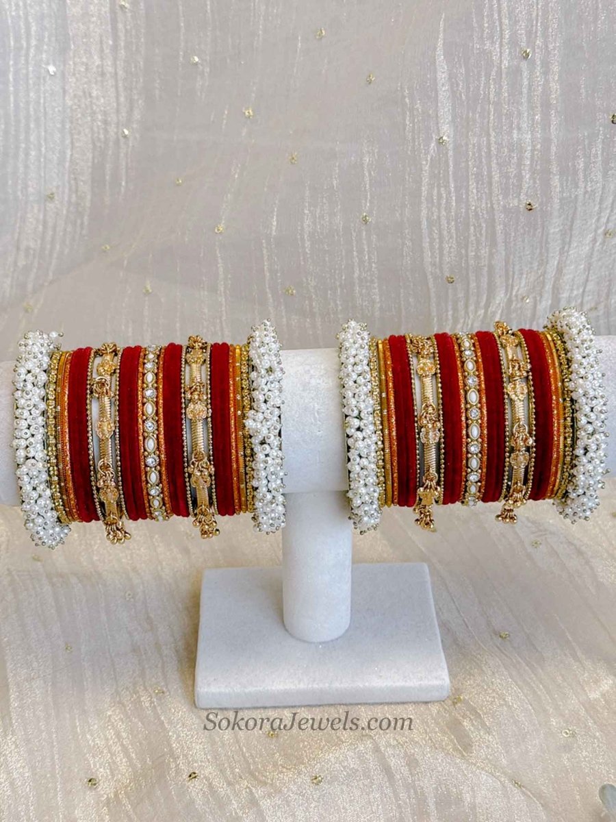 Thanjina Red Bridal Pearl Bangle Set – Indian Wedding Chura - SOKORA JEWELSThanjina Red Bridal Pearl Bangle Set – Indian Wedding ChuraBANGLES