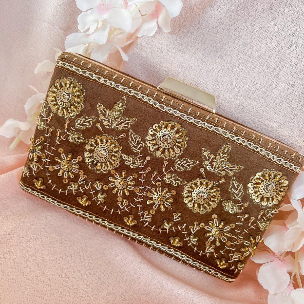 Embellished gold clutch on sale bag