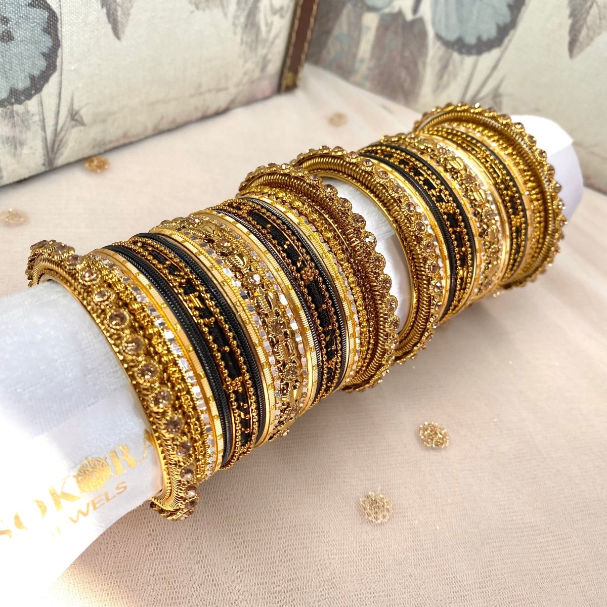 Black and on sale gold bangles